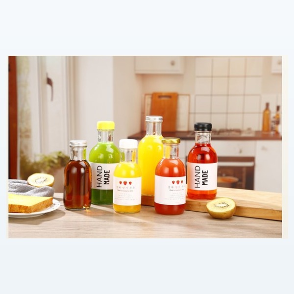 glass beverage bottle reusable drink bottle مع cap — wholesale glass packaging from Eaglebottle China factory