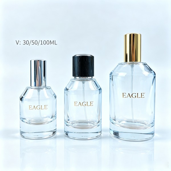 <bdi>45 ml</bdi> cylindrical blue glass perfume bottle مع mist sprayer & collar — wholesale glass packaging from Eaglebottle China factory