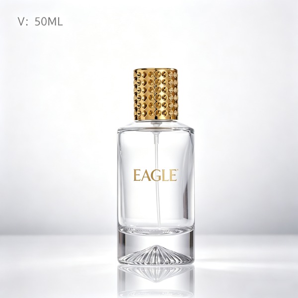 <bdi>100 ml</bdi> round tinted smoke glass perfume bottle atomizer bottle مع decorative cap — wholesale glass packaging from Eaglebottle China factory