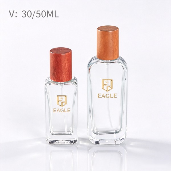 <bdi>25 ml</bdi> tall slim amber glass perfume bottle مع fine-mist atomizer — wholesale glass packaging from Eaglebottle China factory