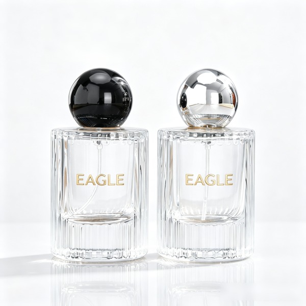 <bdi>25 ml</bdi> tall slim blue glass perfume bottle مع fine-mist atomizer — wholesale glass packaging from Eaglebottle China factory