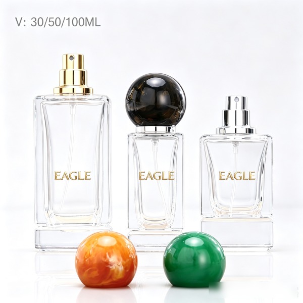 <bdi>25 ml</bdi> tall slim clear glass perfume bottle مع mist sprayer & collar — wholesale glass packaging from Eaglebottle China factory