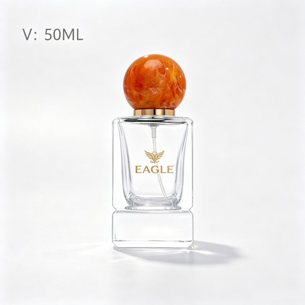 <bdi>100 ml</bdi> round glass perfume bottle مع fine-mist atomizer — wholesale glass packaging from Eaglebottle China factory