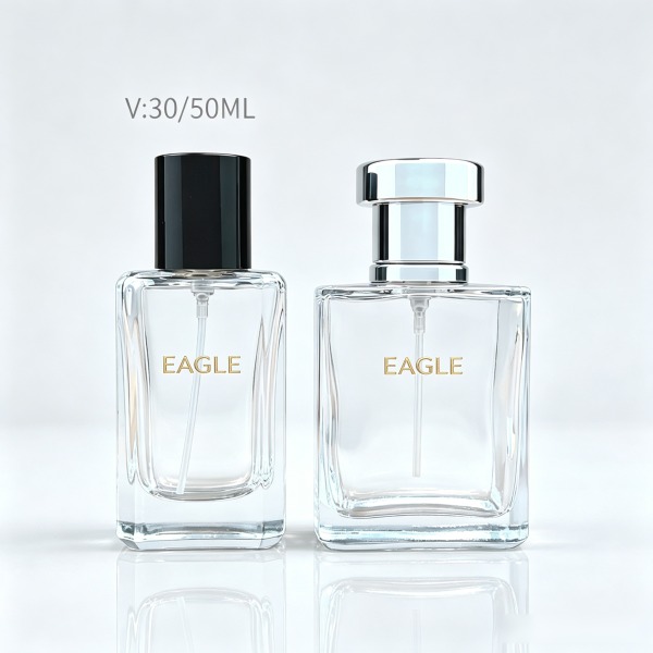 <bdi>25 ml</bdi> tall slim glass perfume bottle مع mist sprayer & collar — wholesale glass packaging from Eaglebottle China factory