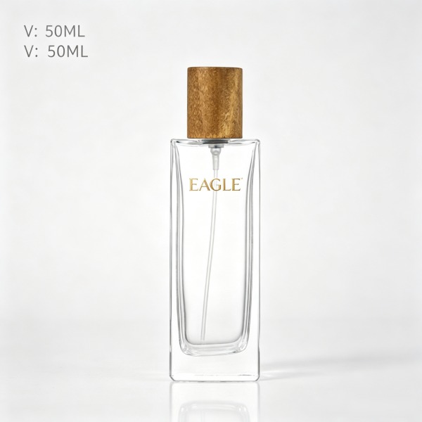 <bdi>25 ml</bdi> tall slim clear glass perfume bottle مع mist sprayer & collar — wholesale glass packaging from Eaglebottle China factory