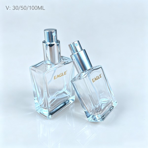 <bdi>45 ml</bdi> cylindrical clear glass perfume bottle refillable spray bottle, wholesale — wholesale glass packaging from Eaglebottle China factory