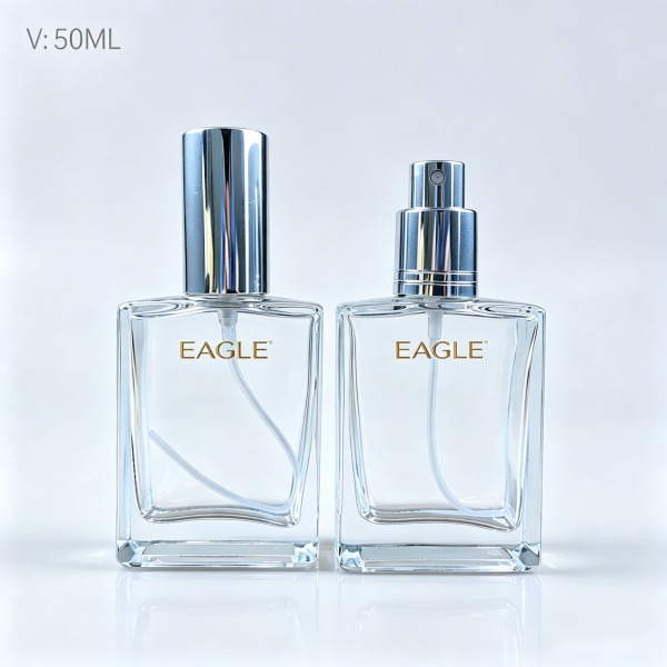 <bdi>45 ml</bdi> cylindrical glass perfume bottle مع fine-mist atomizer — wholesale glass packaging from Eaglebottle China factory