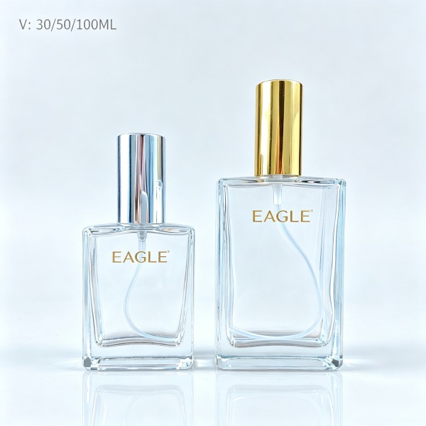 <bdi>45 ml</bdi> cylindrical tinted smoke glass perfume bottle مع mist sprayer & collar — wholesale glass packaging from Eaglebottle China factory