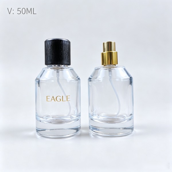 <bdi>100 ml</bdi> round frosted glass perfume bottle مع mist sprayer & collar — wholesale glass packaging from Eaglebottle China factory