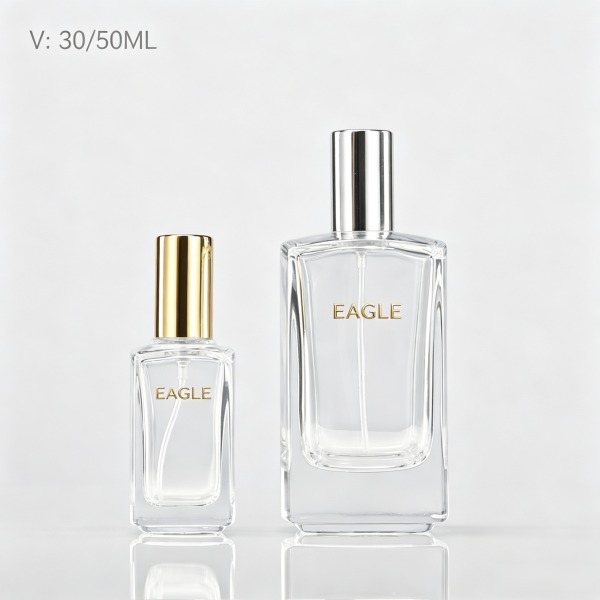 <bdi>50 ml</bdi> rectangular blue glass perfume bottle atomizer bottle مع decorative cap — wholesale glass packaging from Eaglebottle China factory