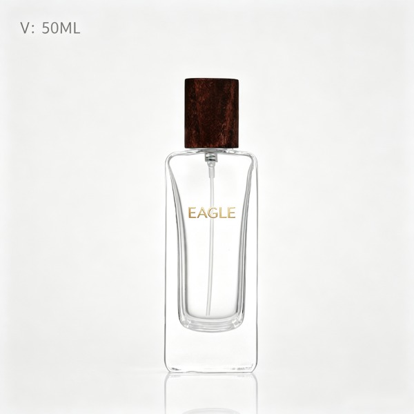 <bdi>50 ml</bdi> rectangular amber glass perfume bottle atomizer bottle مع decorative cap — wholesale glass packaging from Eaglebottle China factory