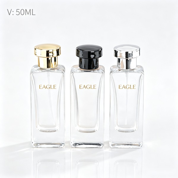 <bdi>50 ml</bdi> rectangular amber glass perfume bottle atomizer bottle مع decorative cap — wholesale glass packaging from Eaglebottle China factory