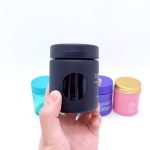 Venda a l'engròs de 3 oz de disseny de colors personalitzats Envàs a prova d'olors de flors amb finestra Pot de vidre hermètic a prova de nens amb tapa resistent a nens | Botella d'àguila