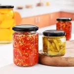 Pogranda Vitra Stoka Bokalo 30ml-1000ml Malplena Ronda Hermetika Pickle Enlatigita Manĝaĵo Konfitaĵo Vitra Ujo Kun Metala Klapo | Aglobotelo