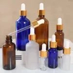 Ampolla de cosmètics de perfum a l'engròs 5 ml 10 ml 15 ml 20 ml 30 ml 50 ml 100 ml Ampolla comptagotes de vidre amb tapa verda blava ambre transparent amb tapa a prova de nens | Botella d'àguila